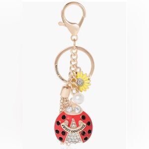 Juicy Couture Lucy Ladybug Keychain with Sunflower Charm